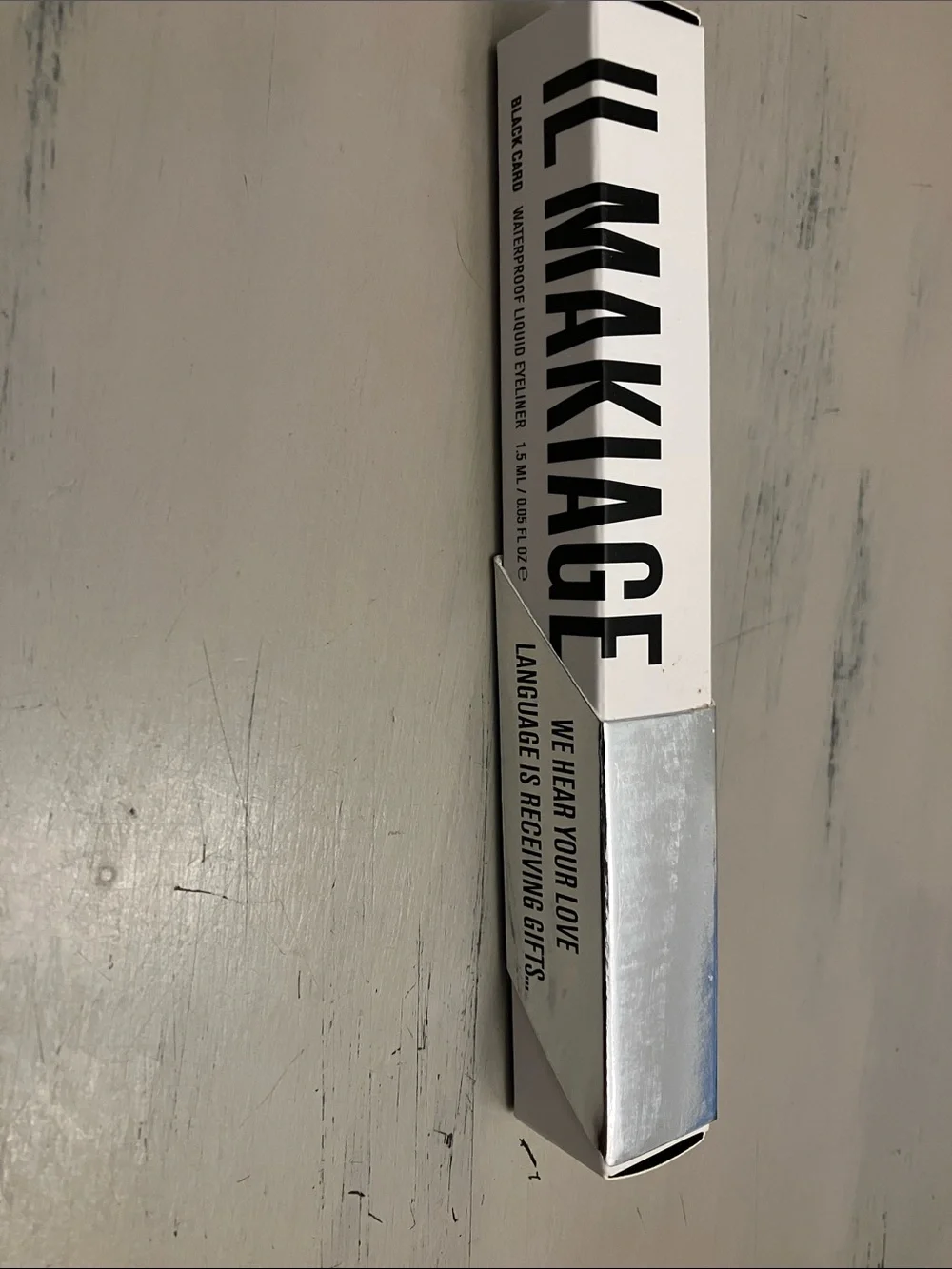 IL MAKIAGE Black Liquid Eyeliner in Black and Silver Packaging